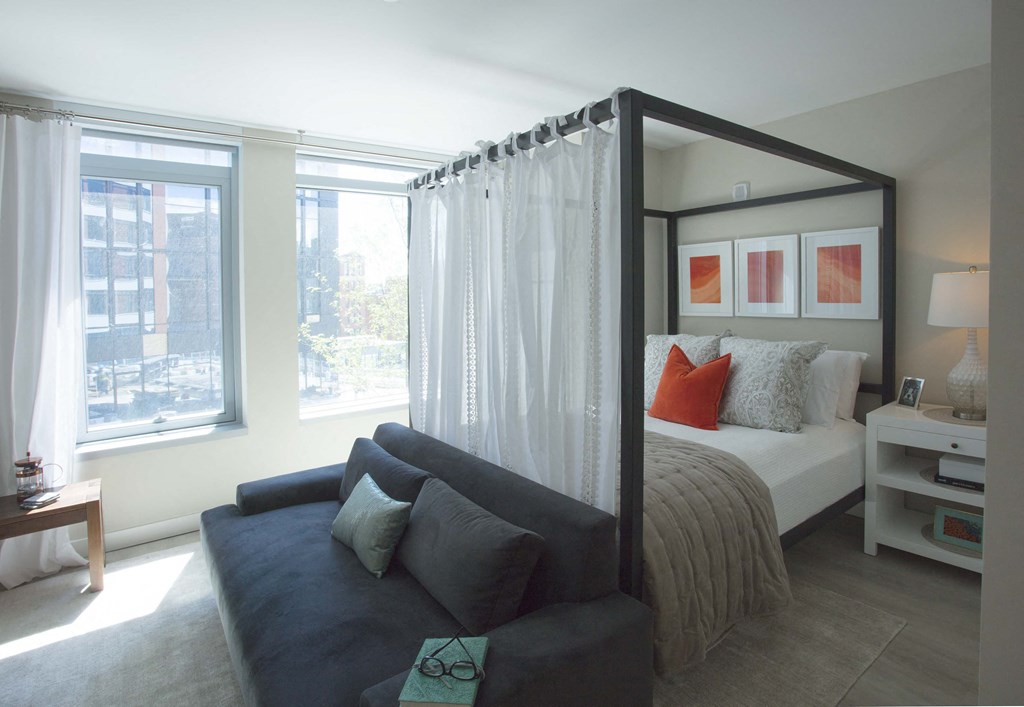 Sunny Studio Apartment Bedroom With Wide Windows at Via Seaport Residences, Boston