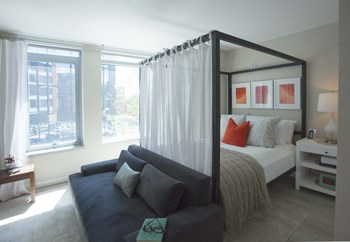 Sunny Studio Apartment Bedroom With Wide Windows at Via Seaport Residences, Boston - Photo Gallery 48
