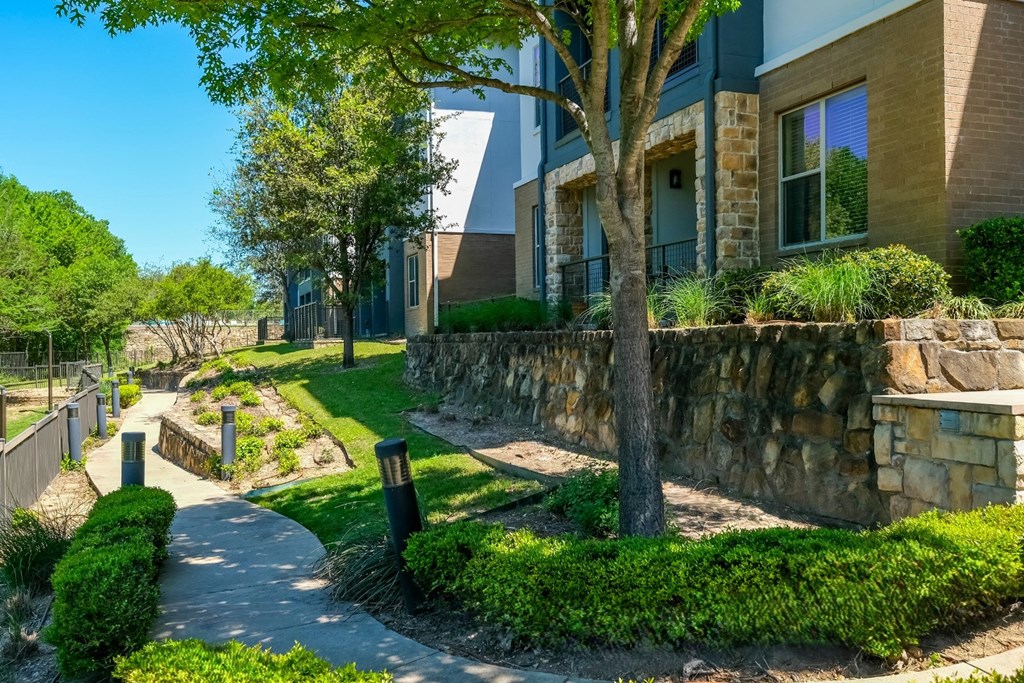 exterior building with lush landscaping at Berkshire Medical District apartments