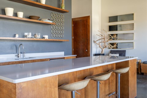 a kitchen with a counter top and a sink