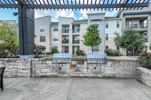 outdoor grilling area at The Allure apartments