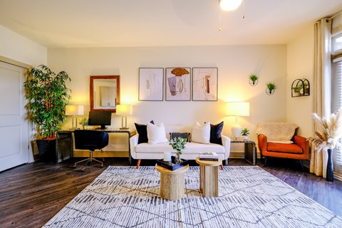 a living room with a couch and a table