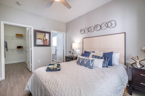 a luxurious bedroom at Verano apartments