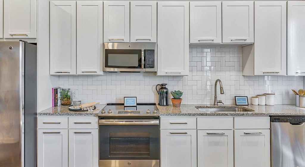 Berkshire Ballantyne epicurean kitchen with opulent white custom cabinetry