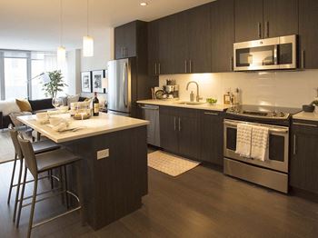 Fully Equipped Kitchen In Clubhouse at The Benjamin Seaport Residences, Boston, Massachusetts