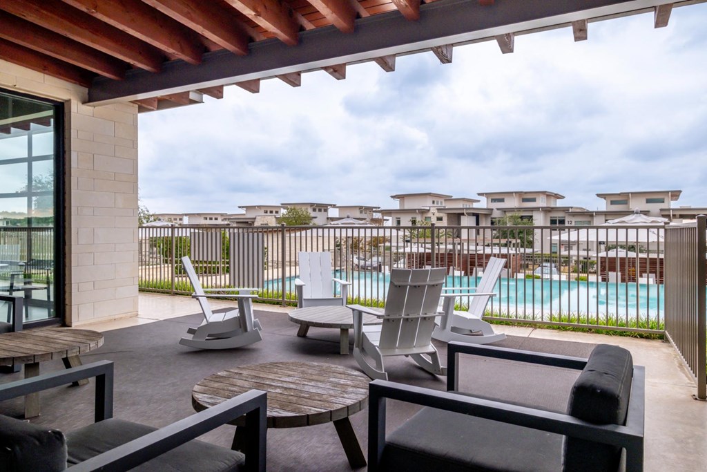 the poolside outdoor lounging area at Berkshire Santal apartments