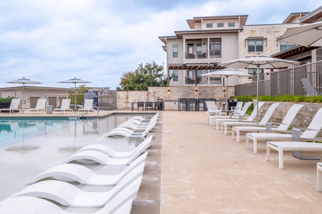 the swimming pool and sunning deck at Berkshire Santal apartments