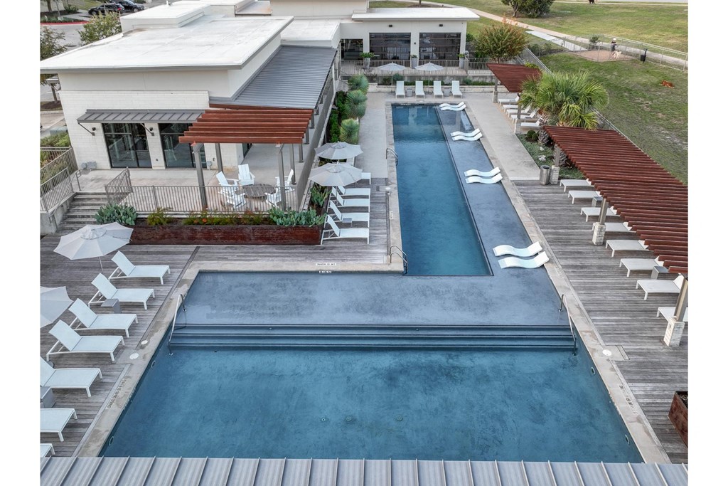 a view of the resort-inspired swimming pool at Berkshire Santal apartments