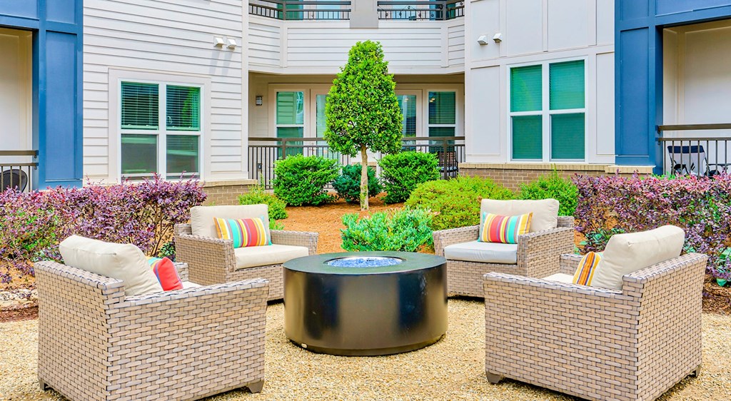 Outdoor fireside lounging at Berkshire Ballantyne apartments
