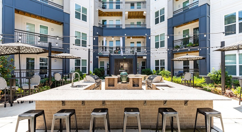 Berkshire Ballantyne outdoor kitchen with grills and al fresco dining