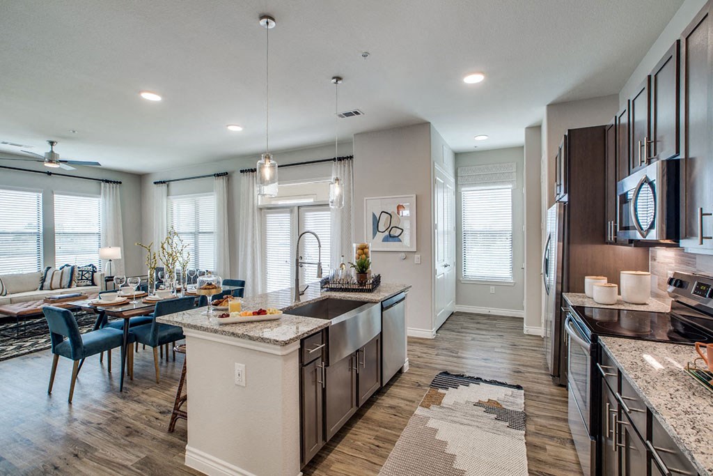Fully Equipped Kitchens And Dining at Berkshire Exchange Apartments, Spring, TX, 77388