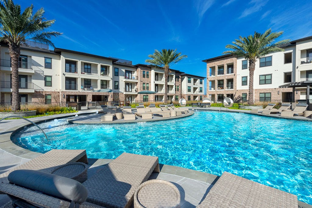 Poolside Lounge Area at Berkshire Exchange Apartments, Texas, 77388