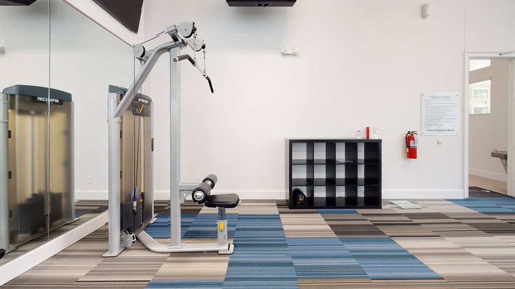 a gym with a blue and white checkered floor