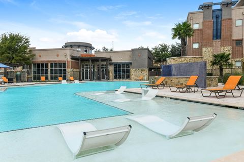 Soho Parkway apartments resort-inspired swimming pool with tanning shelf