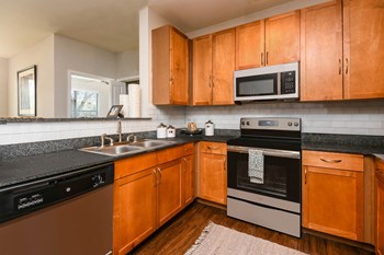 Soho Parkway apartments luxury kitchen - Photo Gallery 6