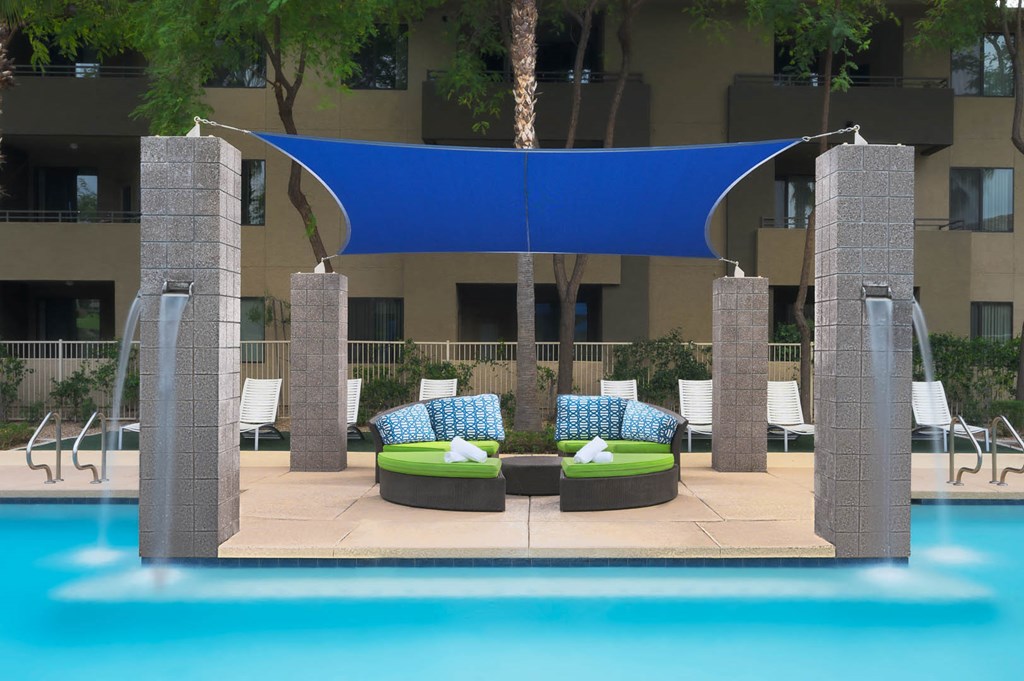 Avora apartments swimming pool and poolside cabanas with comfortable seating