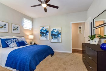 City North at Sunrise Ranch apartments bedroom with ceiling fan - Photo Gallery 12