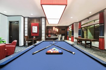 Falls at Eagle Creek apartments social area with billiards - Photo Gallery 8