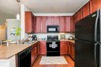 Falls at Eagle Creek apartments spacious kitchen - Photo Gallery 14