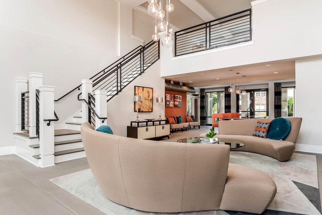 Village at Marquee Station apartments social lounging area with comfortable seating