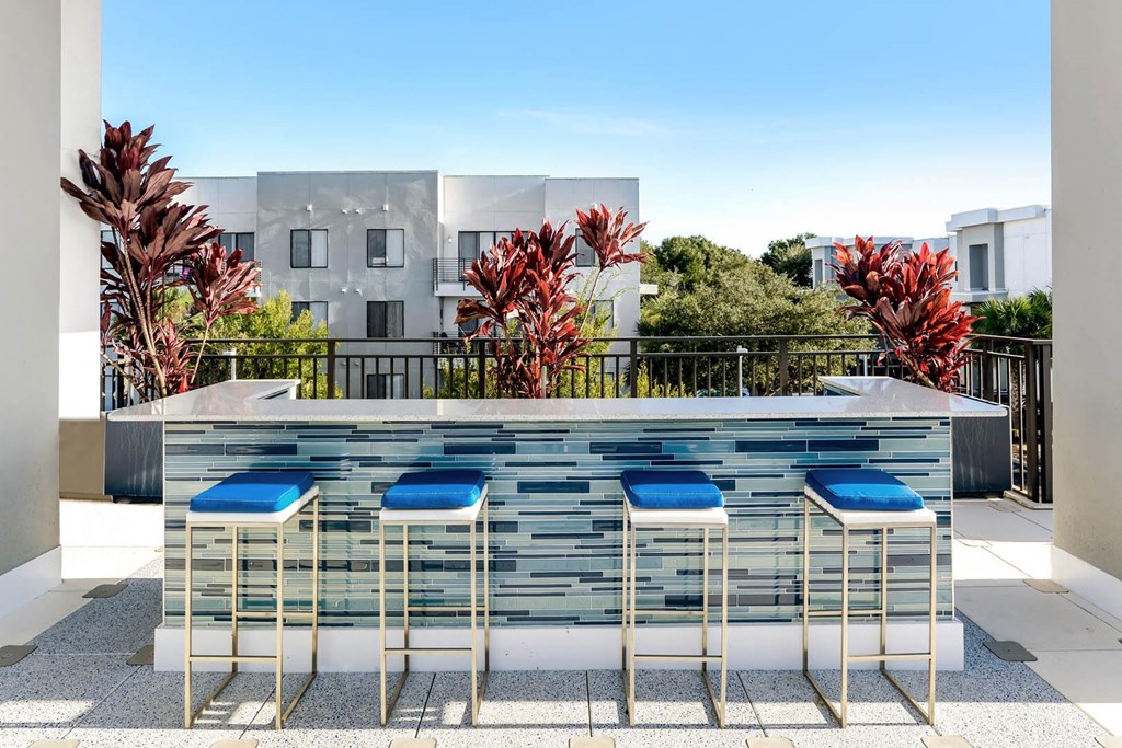 Reveal Heathrow apartments outdoor bar area