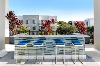 Pure Living apartments outdoor bar area - Photo Gallery 6