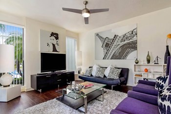 Pure Living apartments living room with ceiling fan - Photo Gallery 15
