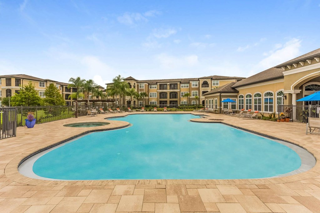 Exterior Pool view of The Reserves at Alafaya during the day time