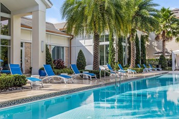 Sancerre at Sand Lake apartments poolside lounging - Photo Gallery 2
