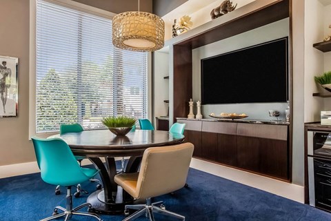 Sancerre at Sand Lake apartments clubhouse media room