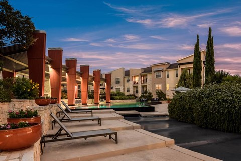 The Allure apartments poolside lounging