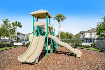 Grand at Cypress Cove apartments playground - Photo Gallery 26