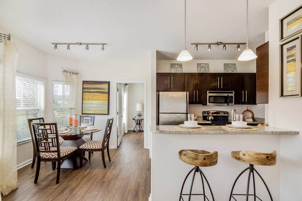 Grand at Cypress Cove apartments with hardwood-inspired flooring
