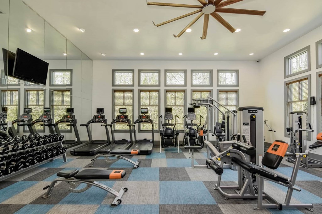 Grand at Cypress Cove apartments fitness center with cardio equipment