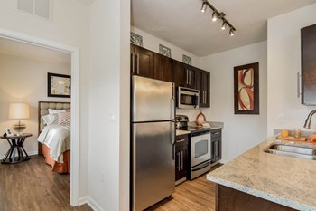 Grand at Cypress Cove apartments luxury kitchen - Photo Gallery 14