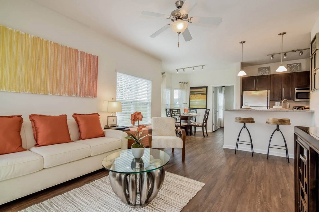 Grand at Cypress Cove apartments living room with ceiling fan