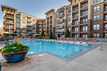 Views at Coolray Field apartments swimming pool and building view - Photo Gallery 15
