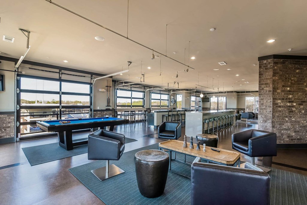 Views at Coolray Field apartments clubhouse   with comfortable seating