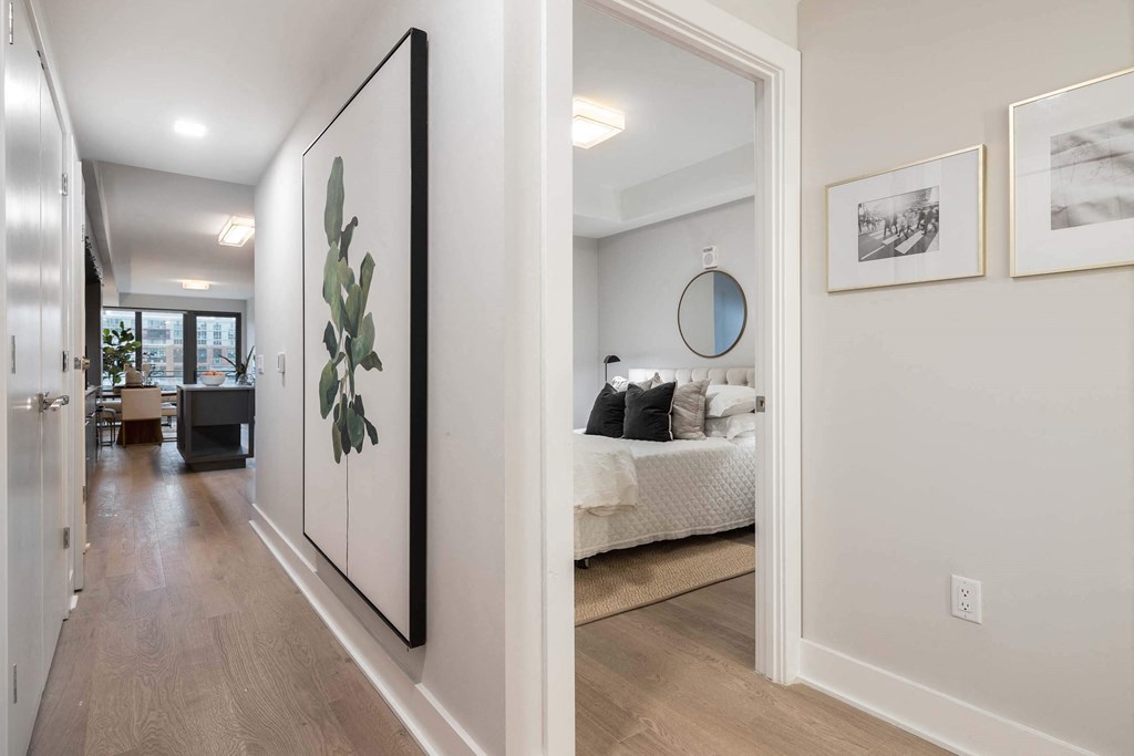 a bedroom and open hallway at Tribeca NOMA apartments