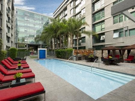 Amenities-Resort-Inspired Lap Pool With Sundeck Resort-Inspired Lap Pool With Sundeck at Met Lofts, Los Angeles, CA, 90015