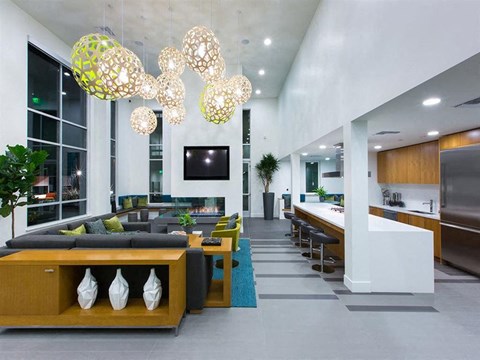 a large living room with furniture and a television