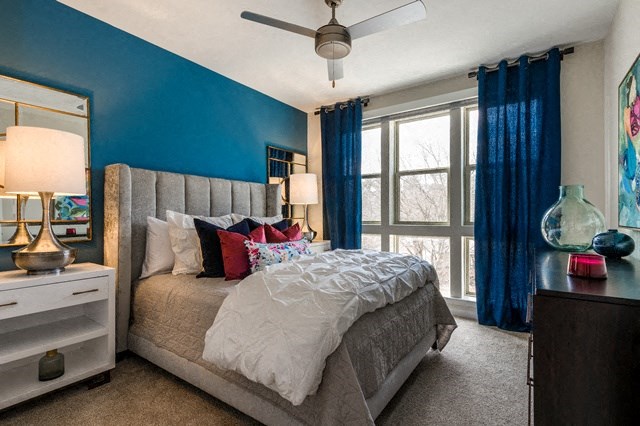 Bedroom with ceiling fan at Berkshire Chapel Hill, Chapel Hill, 27514