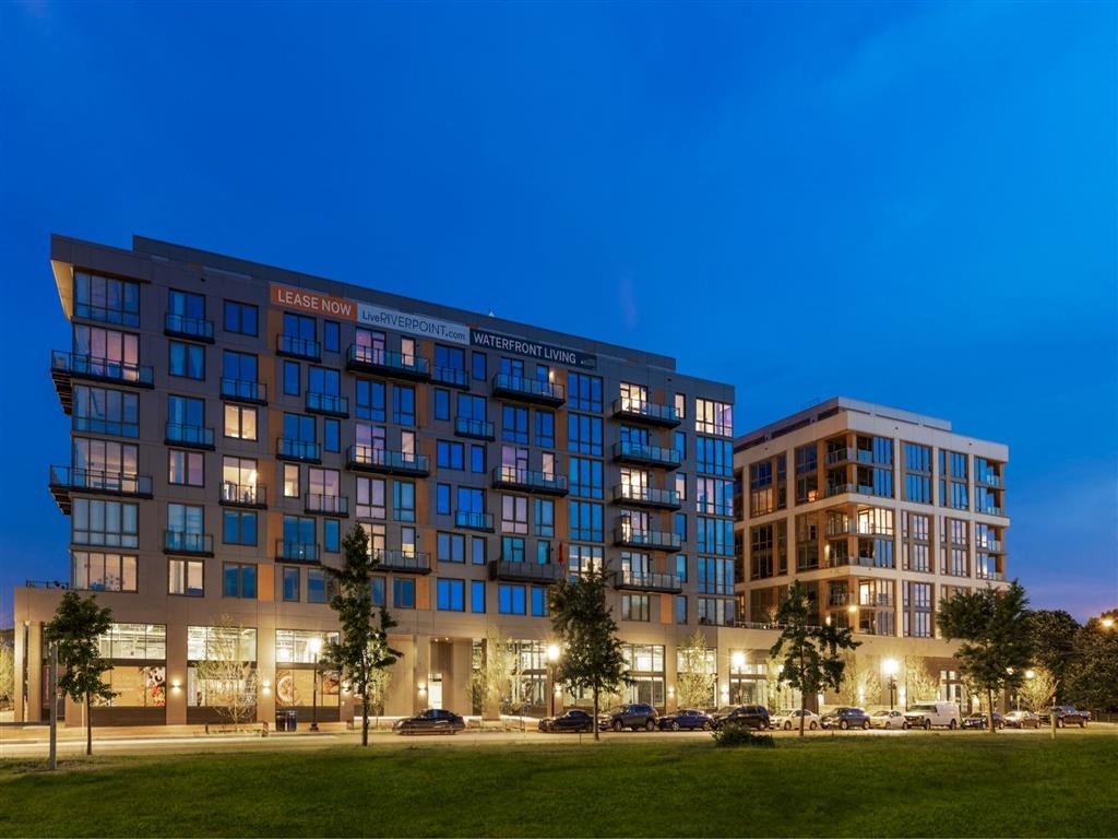 RiverPoint apartments Washington, DC night view of building