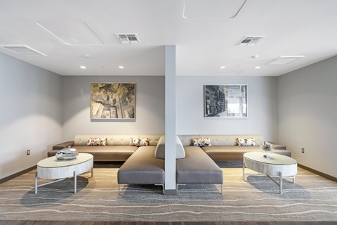 A living room with two couches and a coffee table.