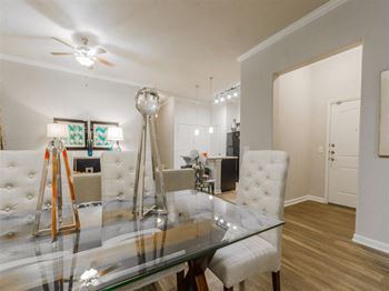 Dining table chair and lights at Retreat at Magnolia, Texas