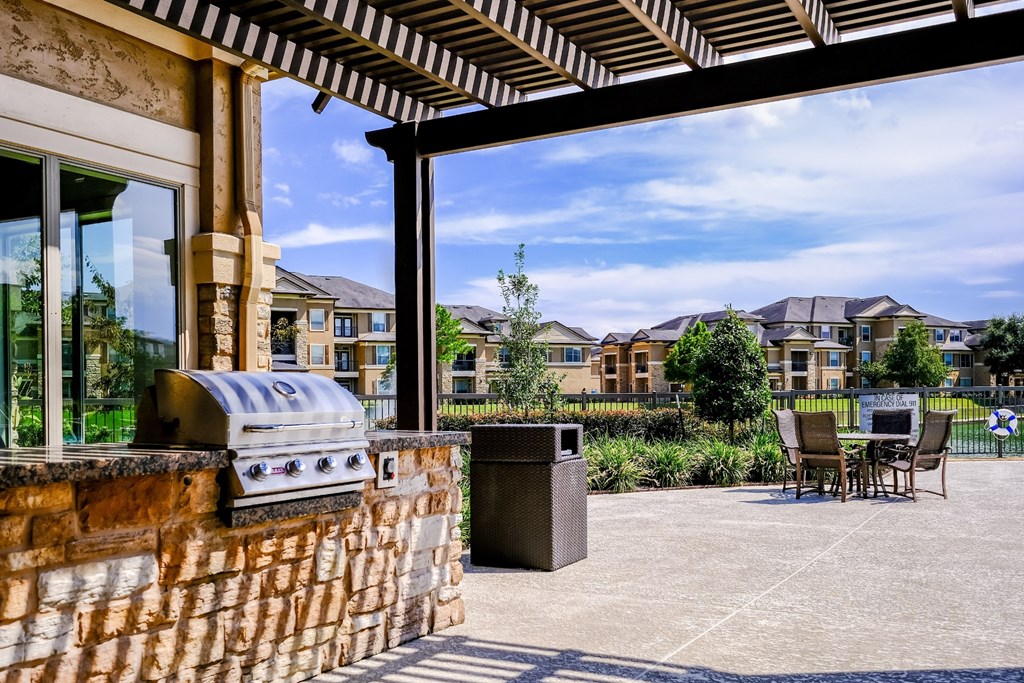 grilling area at The Falls at Copper Lake apartments