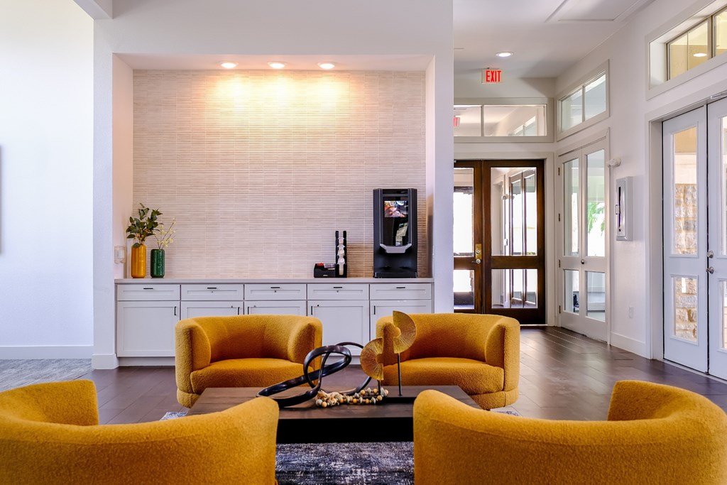social area with conversational seating at The Falls at Copper Lake apartments