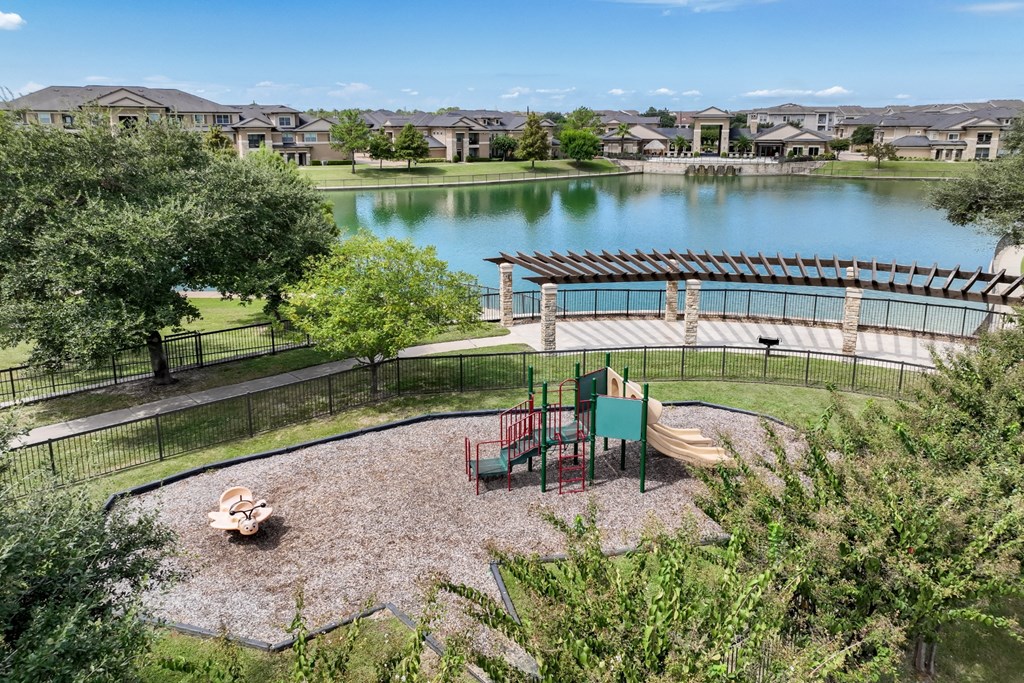 lakeside playground at The Falls at Copper Lake apartments
