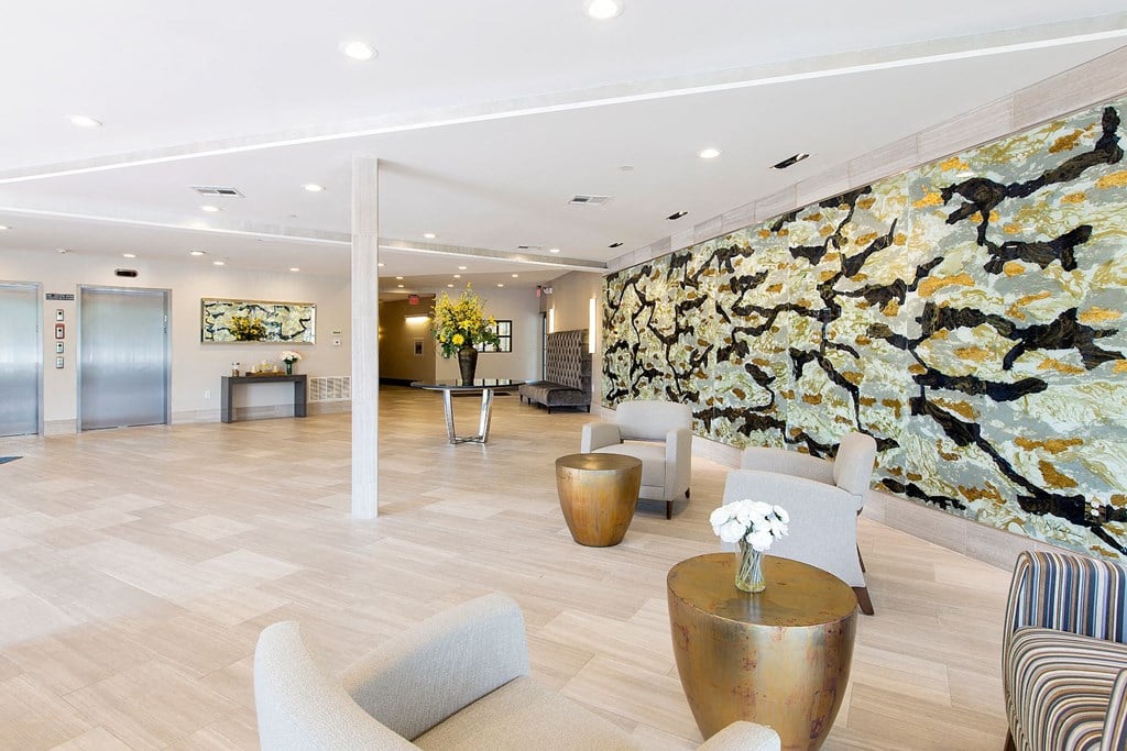 Hotel-Inspired Lobby Entrance with Elevators at Gatehouse 75, Charlestown