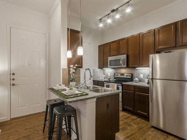 Efficient Appliances In Kitchen at Berkshire Jones Forest, Texas